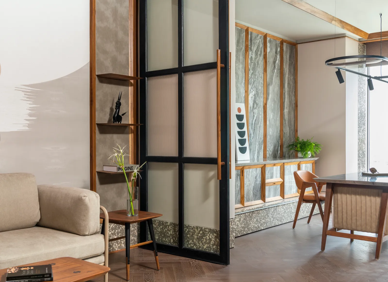 Private cabin seen through steel-framed glass doors