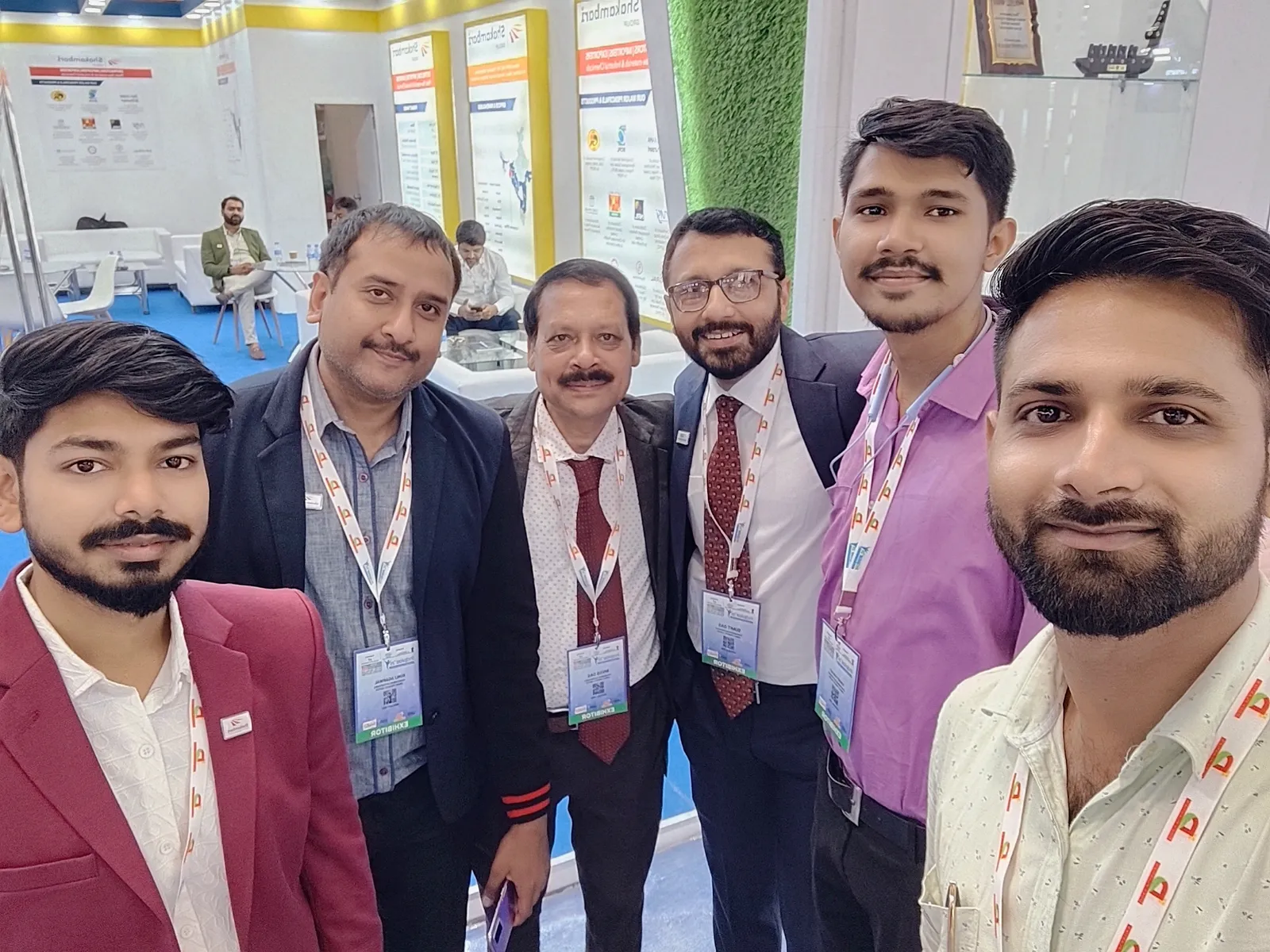 Team group photograph on the exhibition floor, Indplas 2025