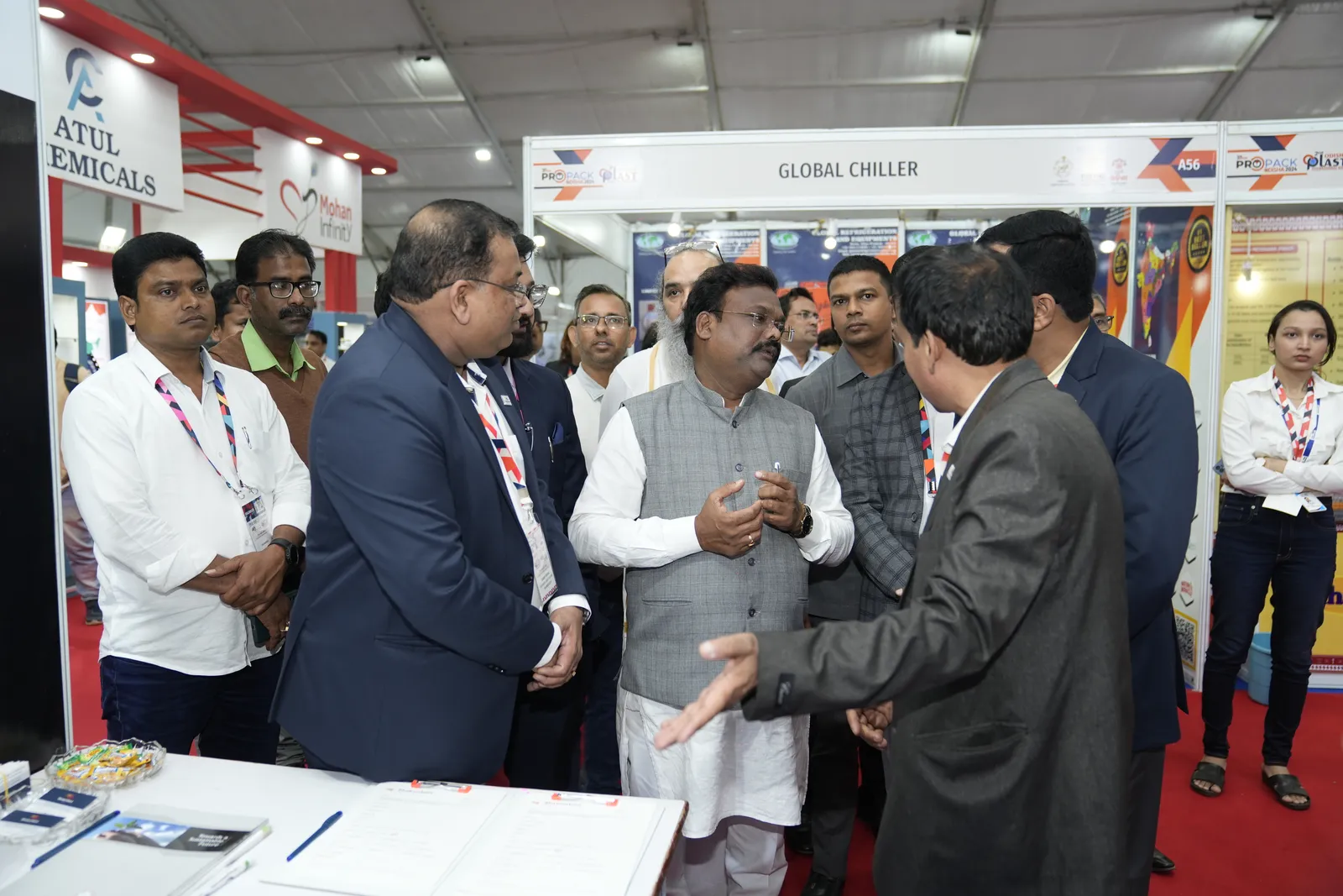 Dignitaries in conversation across the Shakambari counter, Odisha Plast & Propack 2024